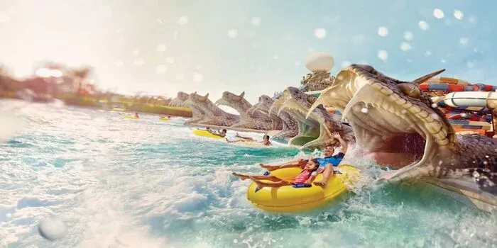 Green park in Abu Dhabi with playgrounds, picnic areas, and scenic walking paths for families