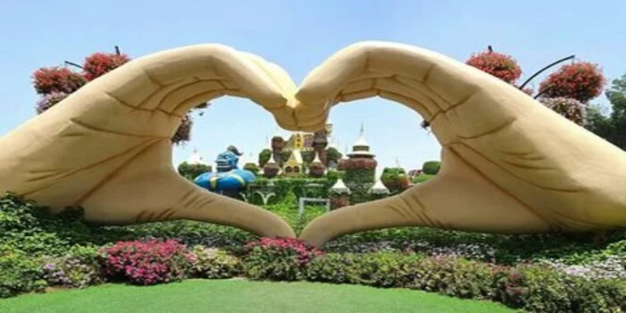 View of Dubai parks with green lawns, walking paths, and family-friendly outdoor areas