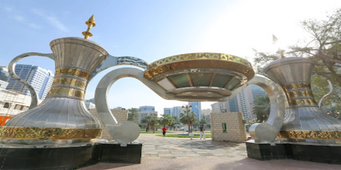 Capital Park Abu Dhabi green public park with fountains and playground in city center