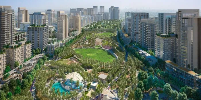 Dubai Hills Park in Dubai Hills Estate with kids playing at splash park, jogging track, and green picnic lawns