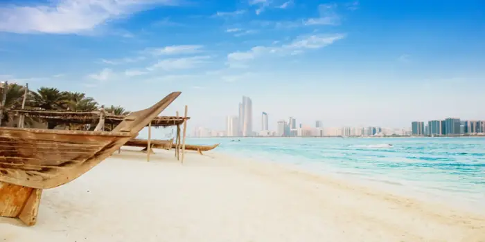 Free beaches in Abu Dhabi showing white sand, clear water, and calm Persian Gulf coastline