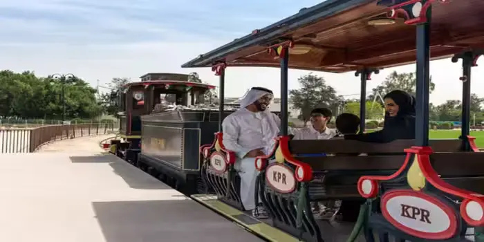 Khalifa Park Abu Dhabi showing gardens, children’s train ride, and family attractions