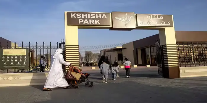 Kshisha Park in Sharjah showing playground, jogging track, and family-friendly outdoor area