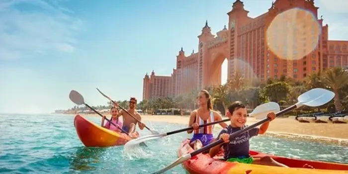 Outdoor activities in Dubai showing desert safari, beaches, and scenic parks