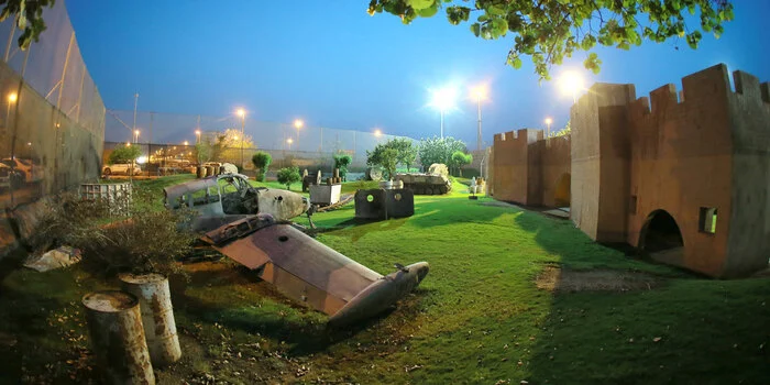 Players enjoying paintball games at Sharjah Paintball Park with indoor and outdoor fields in UAE